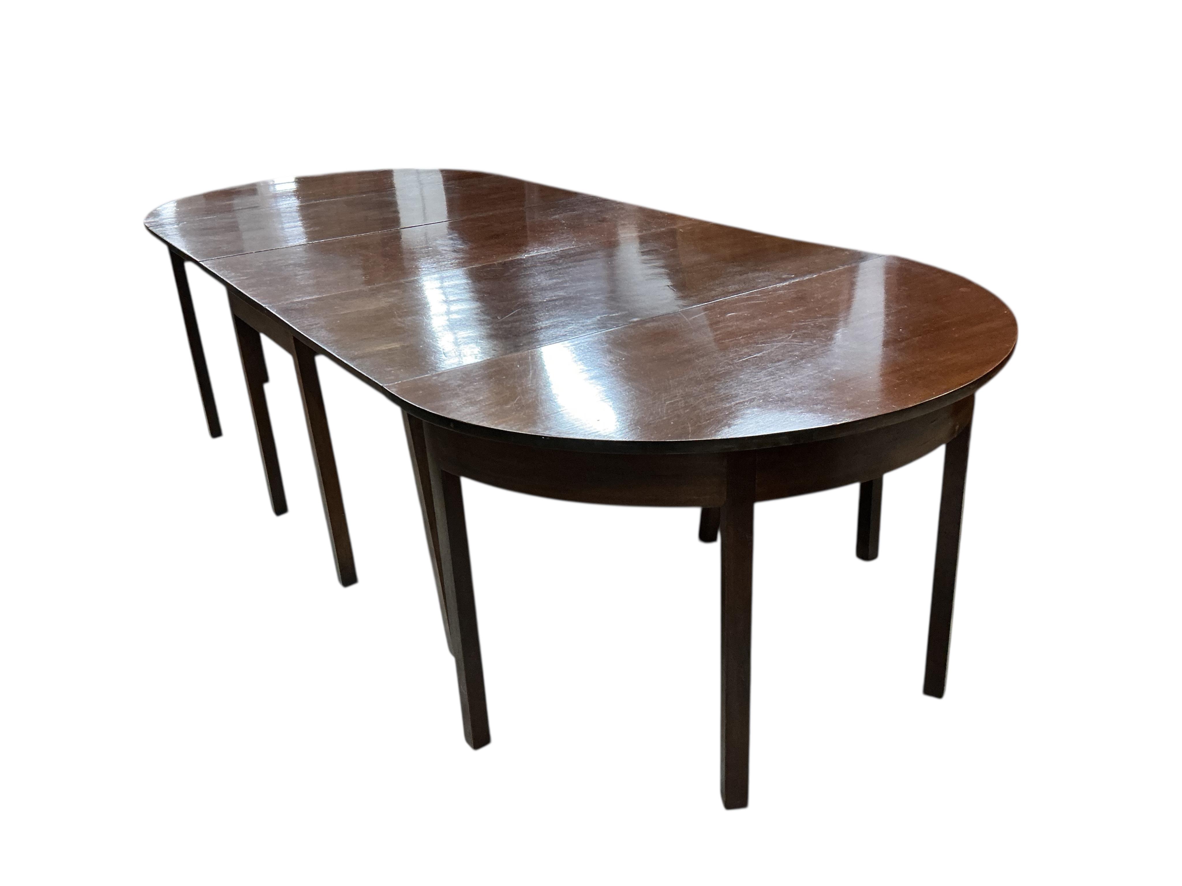 A George III style mahogany D end extending dining table incorporating some old timber, width 294cm extended, depth 122cm, height 73cm